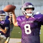 Lake Stevens quarterback Conor Bardue (8) throws a pass in drills during practice Aug. 28, 2017, at Lake Stevens High School. (Kevin Clark / The Herald)
