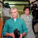 In this Dec. 16, 1997 photo, Randy Weaver leaves the Boundary County courthouse in Bonners Ferry, Idaho, with his friend Linda Thompson after Weaver testified in the probable cause hearing of FBI sharpshooter Lon Horiuchi. (AP Photo/Jeff T. Green, File)