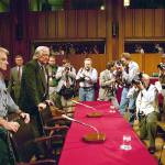 In this Sept. 6, 1995 photo, photographers capture the arrival on Capitol Hill in Washington of Randy Weaver (left) and his attorney Gerry Spence for a hearing of a Senate Judiciary subcommittee. (AP Photo/Dennis Cook, File)