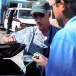 Robert Peterson directs waste to the correct receptacle during the Everett Food Truck festival. Peterson is a volunteer Waste Warrior in the Sustainable Community Stewards program run by WSU Extension Snohomish County.
