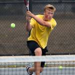 Gunnar Thorstenson returns a backhand as the the Shorewood boys tennis team practices on Wednesday, Aug. 30, 2017 in Shoreline. (Andy Bronson / The Herald)