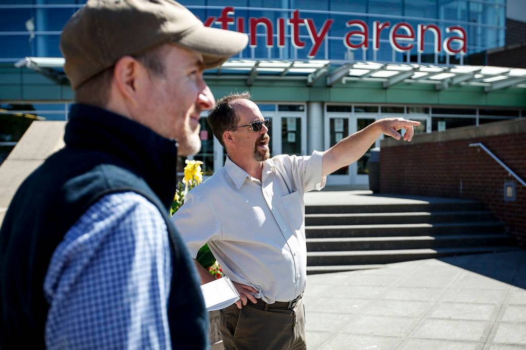 City of Everett planners Niels Tygesen (left) and David Stahlheim take a look at downtown Everetts core. (Ian Terry / The Herald)