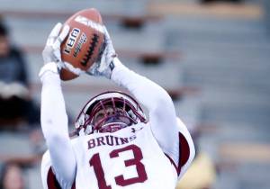 Cascade&rsquo;s Donelle Meriwether makes a reception over Inglemoor&rsquo;s Cole Kindschi during a game Aug. 31 at Pop Keeney Stadium in Bothell. (Kevin Clark / The Herald)