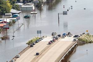 Houston tries to safeguard some areas by flooding others