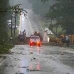 Crews work to remove fallen trees and power lines from the roadway and homes along Highway 18 in Fayette, Ala., after a tornado went through Fayette County on Thursday, Aug. 31, 2017. (Erin Nelson /The Tuscaloosa News via AP)