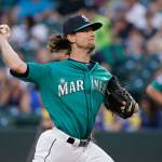 Mariners starting pitcher Mike Leake throws to the Athletics during the first inning of a game on Friday in Seattle. (AP Photo/Ted S. Warren)