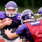 Kamiak&rsquo;s Ben Barton carries the ball during practice Sept. 6, 2017, at Kamiak High School in Mukilteo. (Kevin Clark / The Herald)
