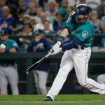 The Mariners&rsquo; Ben Gamel hits a three-run home run against the Angels during the second inning of a game Sept. 8, 2017, in Seattle. (AP Photo/Ted S. Warren)