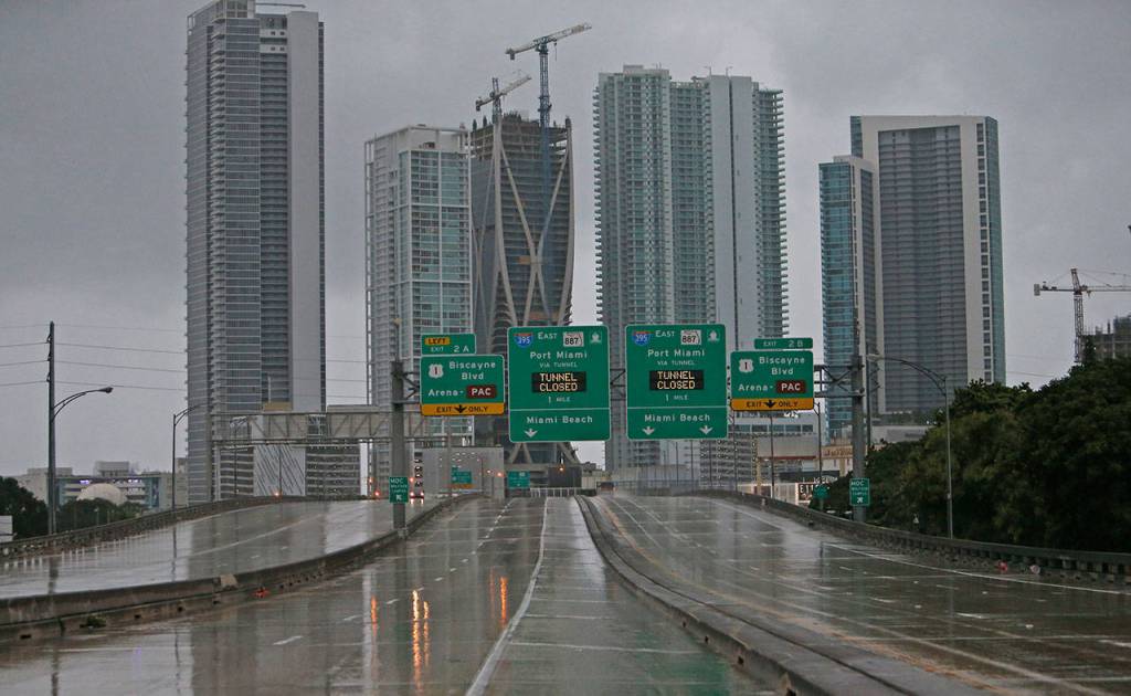 The Interstate remains empty as the outer bands of Hurricane Irma reached South Florida early Saturday, Sept. 9, 2017 in Miami. Gov. Rick Scott is urging anyone living in an evacuation zone in southwest Florida to leave by noon as the threat of Hurricane Irma has shifted west. (David Santiago/Miami Herald via AP)