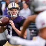 Washington&rsquo;s Jake Browning eyes the defense looking for a pass Saturday night at Husky Stadium in Seattle on September 9, 2017. Washington defeated Montana 63-7. (Kevin Clark / The Herald)