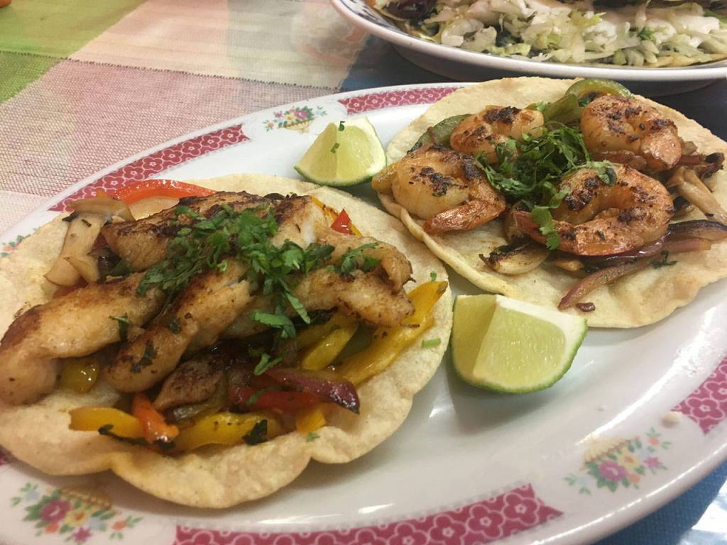 True to the word of Ade&rsquo;s Mexican Deli&rsquo;s staff&rsquo;s word, the fish and shrimp tacos were must-haves, especially with the jalapeño-mayo sauce. (Ben Watanabe / The Herald)