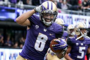 Washington fires on all cylinders in 63-7 rout of Montana