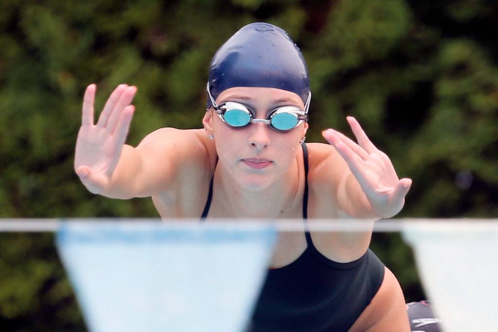 Morgan Broadhead releases from the platform during practice Wednesday afternoon at Klahaya Swim and Tennis Club in Edmonds on Sept. 6. (Kevin Clark / The Herald)