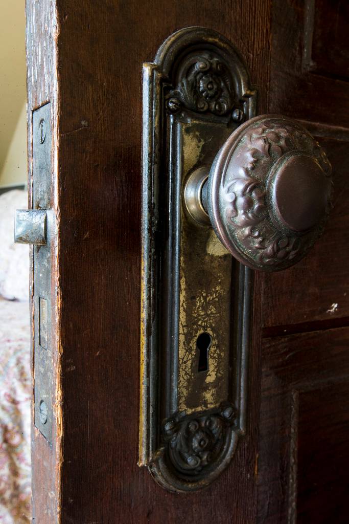 Matching original doorknobs can be found on all doors throughout the house. (Ian Terry / The Herald)