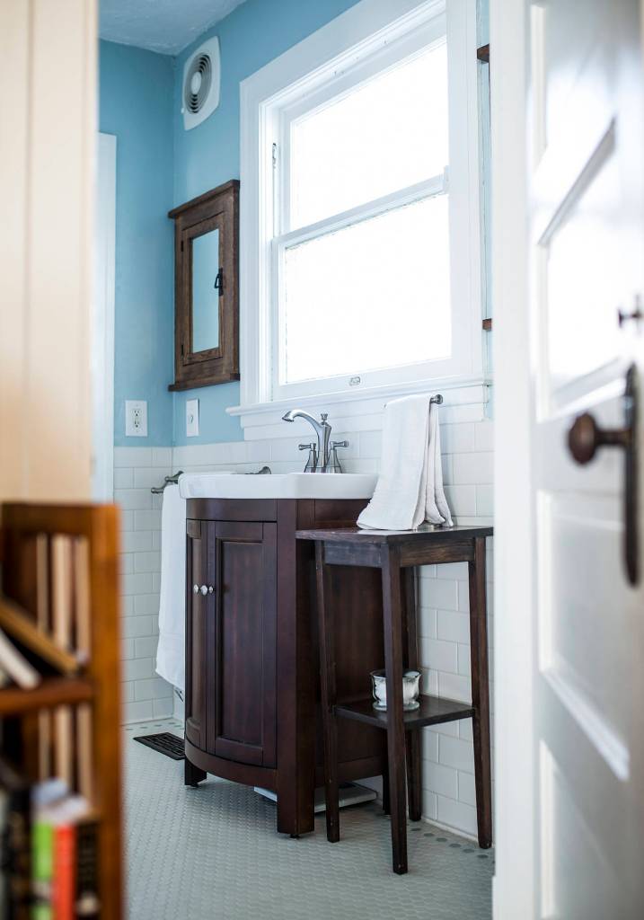 A remodeled first floor bathroom has Scandinavian blue and white tones. (Ian Terry / The Herald)