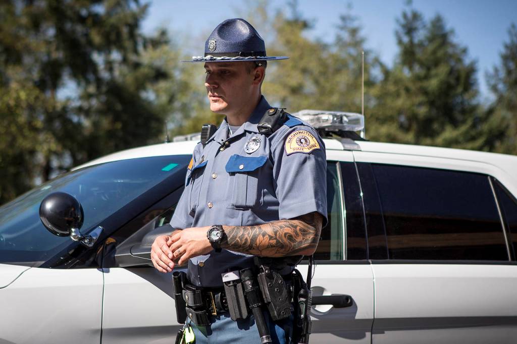 Washington State Trooper Yaroslav Holodkov recounts pulling a man to safety who tried to jump off the Snohomish River bridge north of Everett the evening of Aug. 11. (Ian Terry / The Herald)