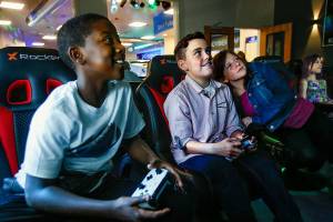 Young students, all from North Lake Middle School, enjoy video games on big screens at the new Dan Pratt Memorial Teen Center in Lake Stevens on Thursday after school let out. From left, they are Shawn Etheridge, 11, Ayden Perez, 11, Riley Gentry, 12, Reegan Pauley, 11, and Brendon Bade, 12. (Dan Bates / The Herald)
