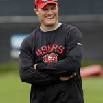 San Francisco 49ers general manager John Lynch stands on the field during the team&rsquo;s organized team activity on June 8, 2017, in Santa Clara, Calif. (AP Photo/Jeff Chiu)