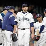 Mariners starting pitcher James Paxton walks away from the mound after being removed during the fourth inning of a game against Rangers on Sept. 21, 2017, in Seattle. (AP Photo/Elaine Thompson)