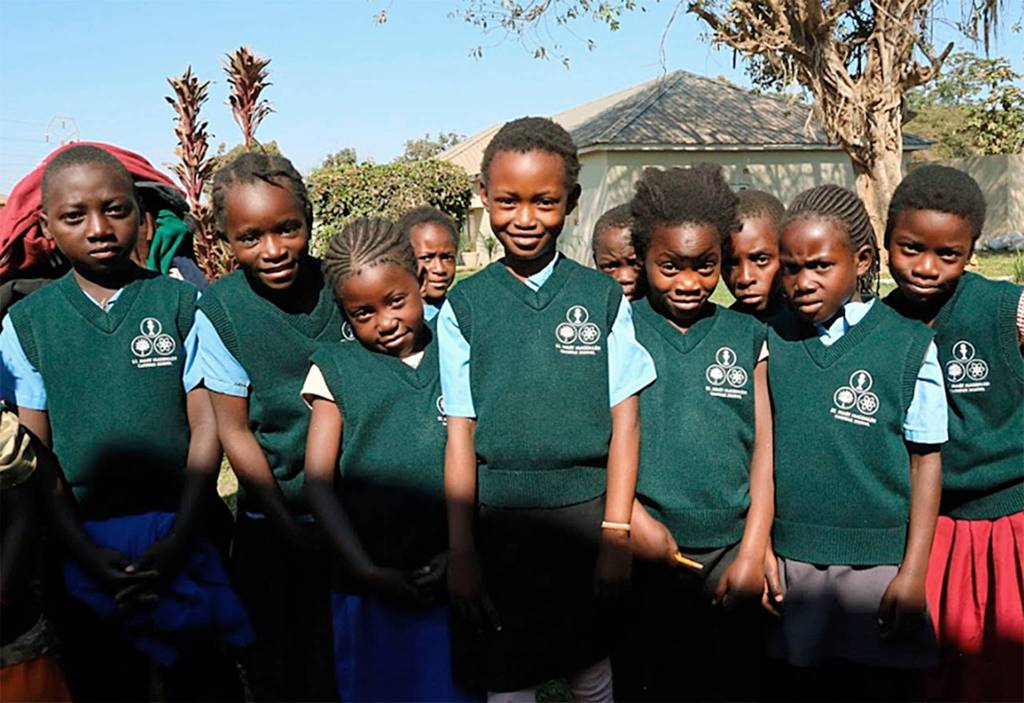 After a color change by the manufacturer, St. Mary Magdalen School in Everett was able to donate uniform vests to a school in Zambia. (Contributed photo)
