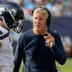 Seattle Seahawks head coach Pete Carroll talks with quarterback Russell Wilson in the first half of Sundays game in Nashville, Tennessee. (AP Photo/Mark Zaleski)