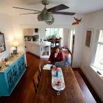 Maria Coghill and her family enjoy an open and airy layout in what formerly was a house with lots of small rooms. (Dan Bates / The Herald)