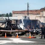 Burnt debris from Everett Office Furniture, on Broadway in Everett, is seen on Tuesday, Sept. 26. (Ian Terry / The Herald)