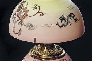 Stylish student lamp made of Burmese glass sells for $3,330