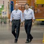 House Speaker Paul Ryan (right) arrives with Dennis Muilenburg, chairman and chief executive officer of Boeing, to a town hall meeting at the Boeing factory in Everett on Aug. 24. (David Ryder / Bloomberg News)