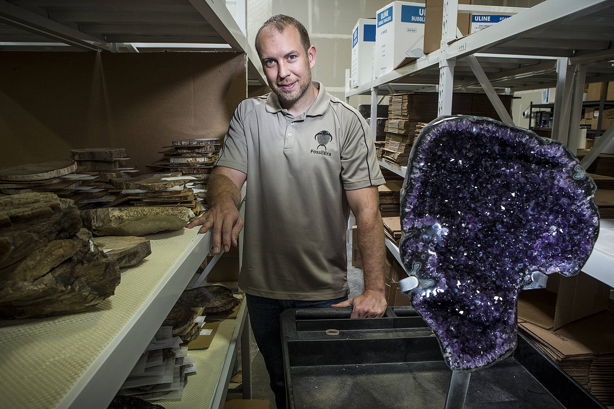 Matt Heaton, owner of FossilEra in Monroe, is putting on a wine and fossils event at a Woodinville winery. (Ian Terry / The Herald)