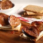 Fresh figs are roasted in a syrup of honey, butter, cinnamon and orange zest then sandwiched (or left open face) between crumbly oat cakes smeared with rich creme fraiche. (Abel Uribe/Chicago Tribune)