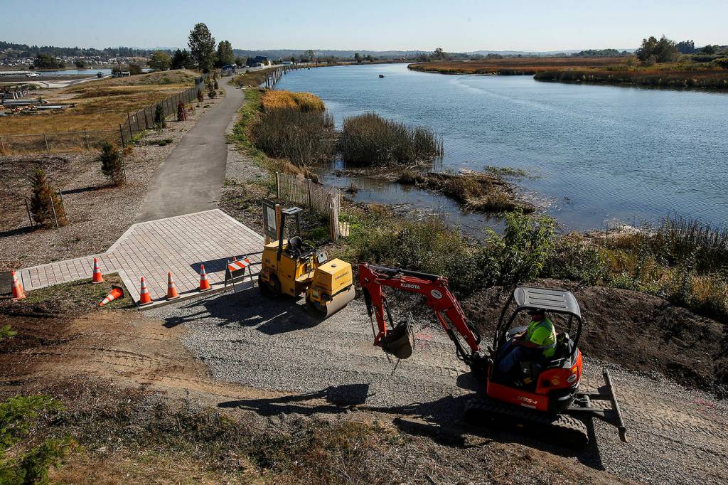 Work continues on the Ebey Waterfront Trail, which will eventually connect to parking by going underneath the bridge on Highway 529 heading into Marysville. (Ian Terry / The Herald)