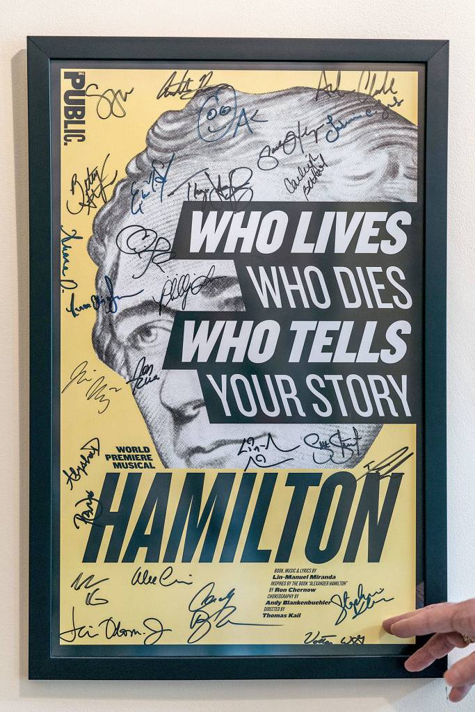 A poster from Hamilton, the musical, hangs in the foyer of Ron Chernows home. (Photo for The Washington Post by Michael Rubenstein)