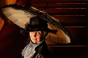 Carolyn Hetherwick Goza, a member of Everetts First Presbyterian Church, models a period dress at the church that would have been appropriate Sunday garb in 1892. Goza will perform an historical skit at Sundays Celebrating Gods Love concert, an event at First Presbyterian marking the 125th anniversaries of five Everett churches. (Dan Bates / The Herald)