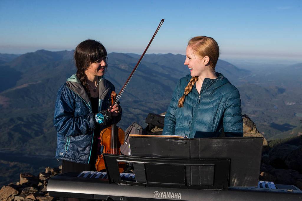 Anastasia Allison (left) and Rose Freeman share a laugh before playing their first tune of the recital. (Ian Terry / The Herald)