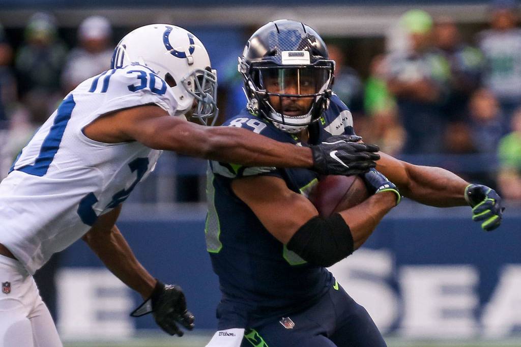 Colts corner back Rashaan Melvin closes on Seahawks wide receiver Doug Baldwin after a reception Sunday night at CenturyLink Field in Seattle on October 1, 2017. Seahawks won 46-18. (Kevin Clark / The Herald)