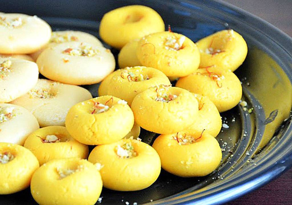 Pedhas are Indian ball-shaped sweets made with milk, milk powder, butter and sugar, plus traditional flavorings like cardamom, pistachio and saffron. (Reshma Seetharam/For The Herald)