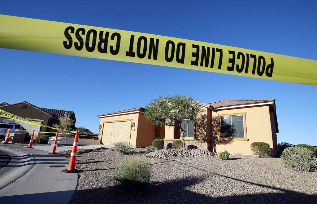 Police tape blocks the home of Stephen Craig Paddock on Monday in Mesquite, Nevada. (AP Photo/Chris Carlson)