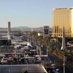The Mandalay Bay resort and casino (right) overlooks the outdoor festival grounds across the street (left) in Las Vegas where 59 people died Sunday. (John Locher / Associated Press)