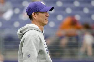 UW assistant Gregory enjoys being in background