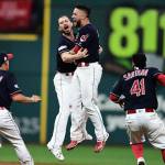 Indians starting pitcher Josh Tomlin celebrates with Yan Gomes (second from right) after Gomes hit a game-winning single in the 13th inning of Game 2 of the American League Division Series against the Yankees on Oct. 6, 2017, in Cleveland. (AP Photo/David Dermer)
