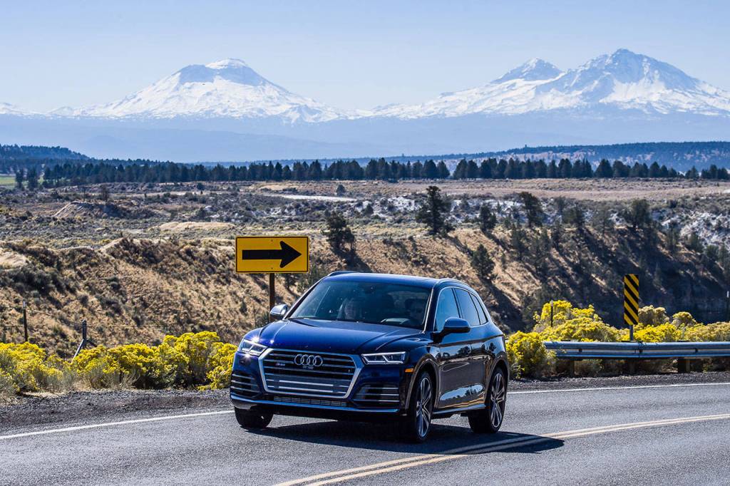 Mary Lowry drives the 2018 Audi SQ5 3.0T Quattro near Peter Skene Ogden State Park in Oregon during Run to the Sun. Paige Tatulli, representing Audi, is in the passenger seat. The SQ5 was voted best SUV in the event evaluating fun-to-drive performance vehicles. (Doug Berger / NWAPA)