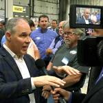 EPA Administrator Scott Pruitt talks to a reporter after speaking at Whayne Supply in Hazard, Kentucky, on Monday. (AP Photo/Adam Beam)