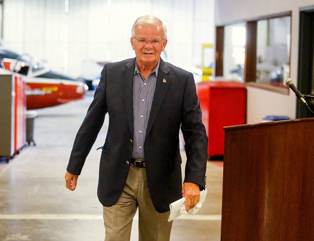 Rick Lengyel steps away from the podium after speaking to fellow celebrants at the 50th anniversary celebration of the EvCC Maintenance Technology School at Paine Field Wednesday. He headed the program for more than a decade. (Dan Bates / The Herald)