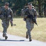 U.S. Army Sgt. Grant Reimers (left), assigned to U.S. Army National Guard, and Sgt. Kevin Beuse, assigned to U.S. Army Cyber Command, conduct a 15-mile ruck march while competing in the Best Warrior Competition at Fort A.P. Hill, Va., Oct 2, 2017. (U.S. Army photo by Pfc. Miguel Pena)