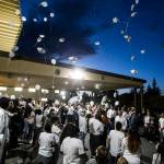 Family and friends of slain teenager David Sandoval release white balloons following a service at Bible Baptist Church on W. Casino Road in Everett to honor his life on Tuesday evening. (Ian Terry / The Herald)