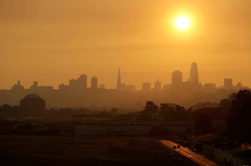 Smoke and haze from wildfires hovers over the skyline Thursday in San Francisco. (AP Photo/Eric Risberg)