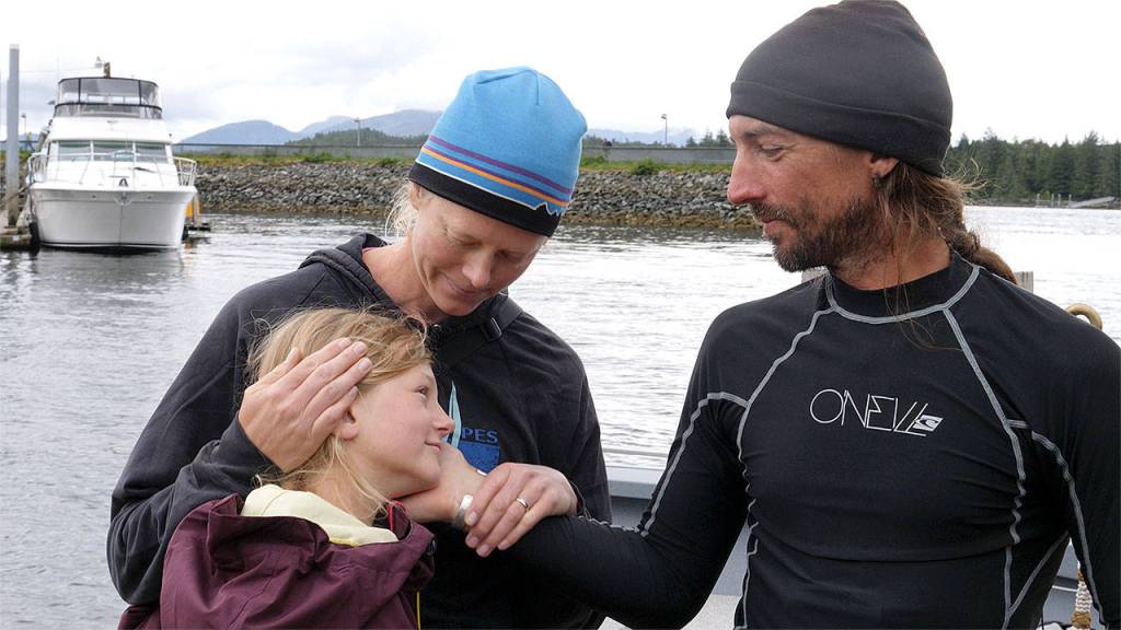 Karl Kruger greets his wife, Jessica, and daughter, Dagny, after finishing the Race to Alaska in Ketchikan. (Photo courtesy of Karl Kruger)