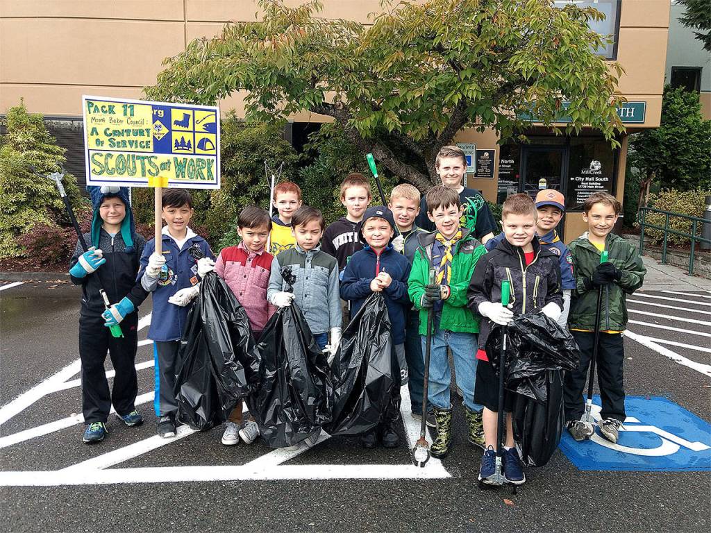In Mill Creek, Pack 11 took part in a community clean-up effort, picking up litter from City Hall to the sports park, as part of a Day of Service marking the centennial year of the Mount Baker Council. (Contributed photo)