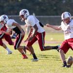 Cascade senior Sarmad Aqrawi kicks off during practice Oct. 5, 2017, at Cascade High Schoolin Everett. (Kevin Clark / The Herald)